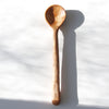 Long handled wide stirring spoon, hand carved from black birch